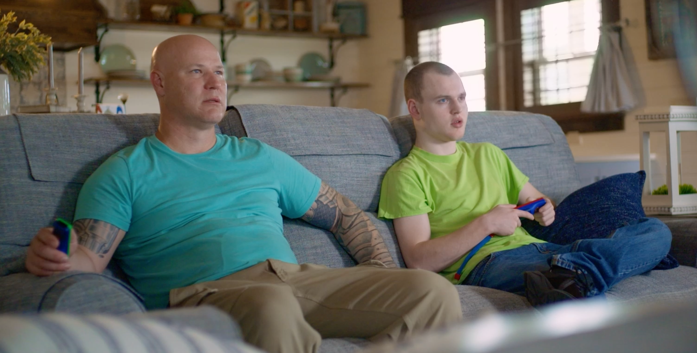 men sitting on couch