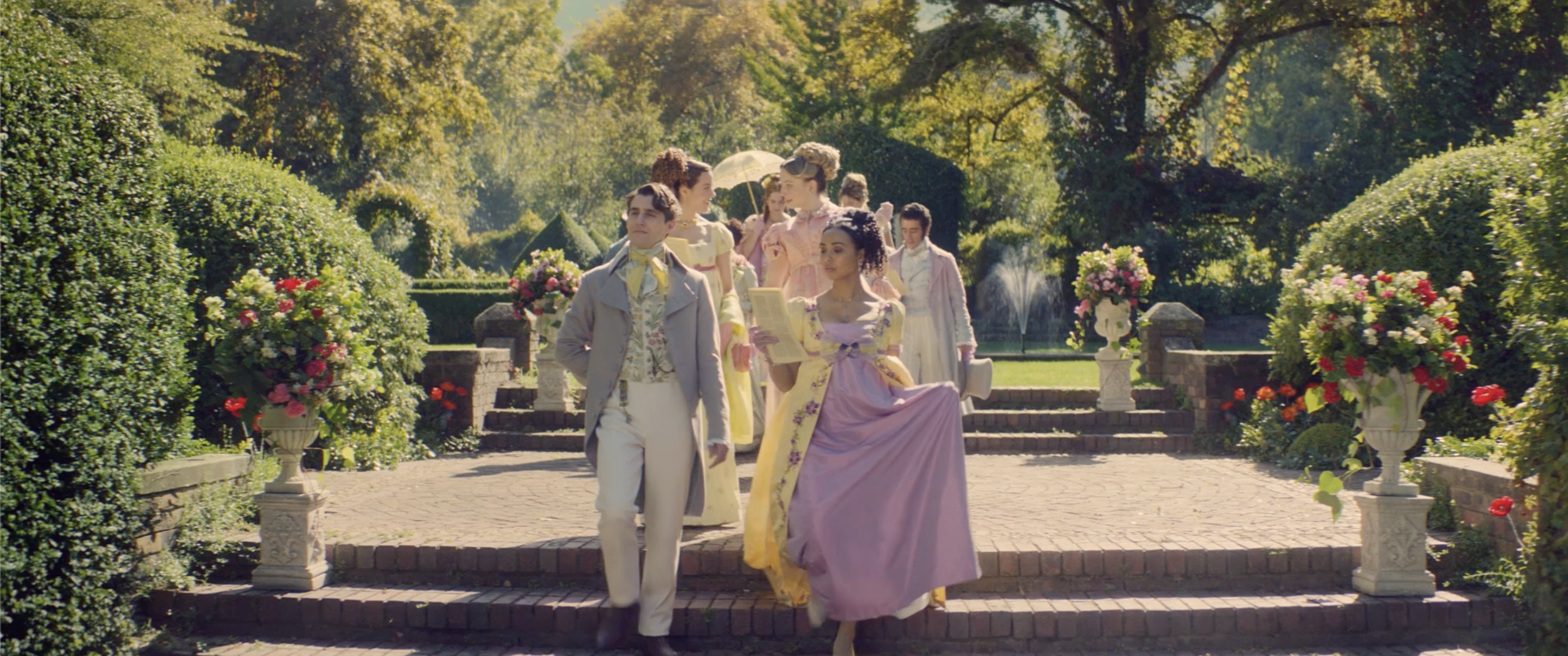 couple walking through garden